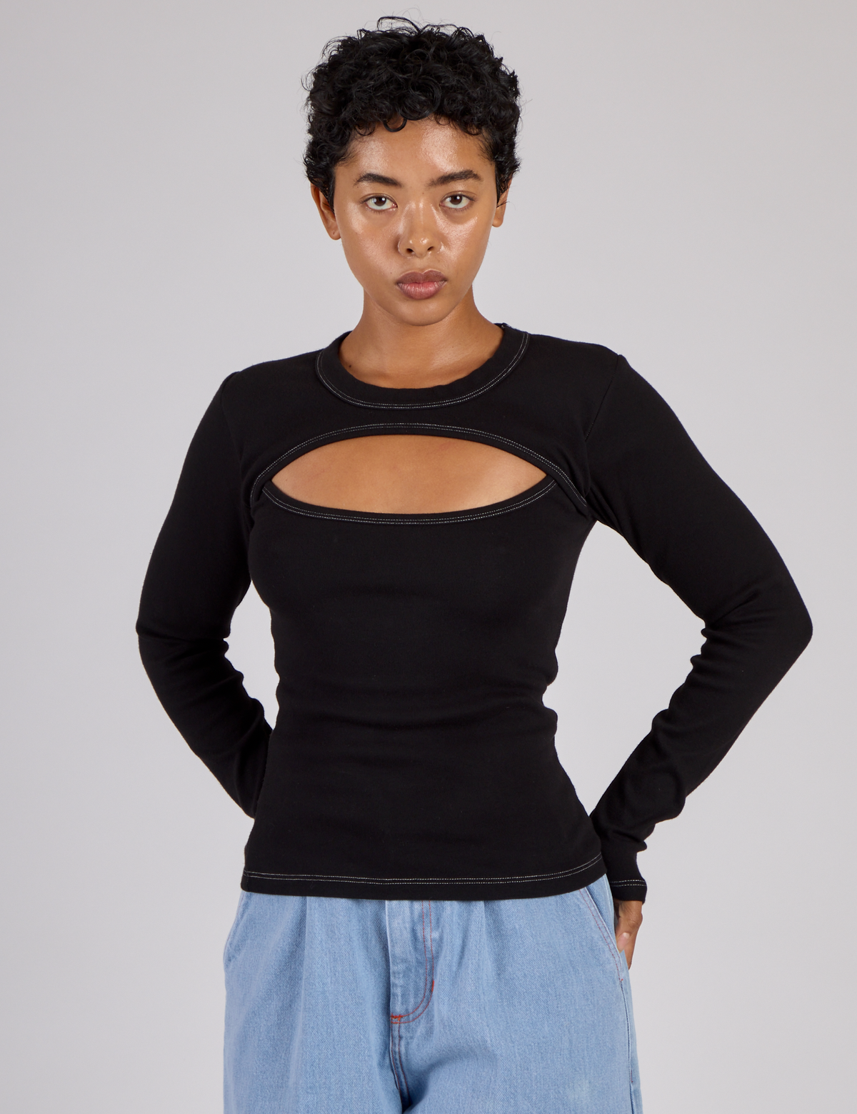 Mika wearing the Black Porthole Long Sleeve Tee