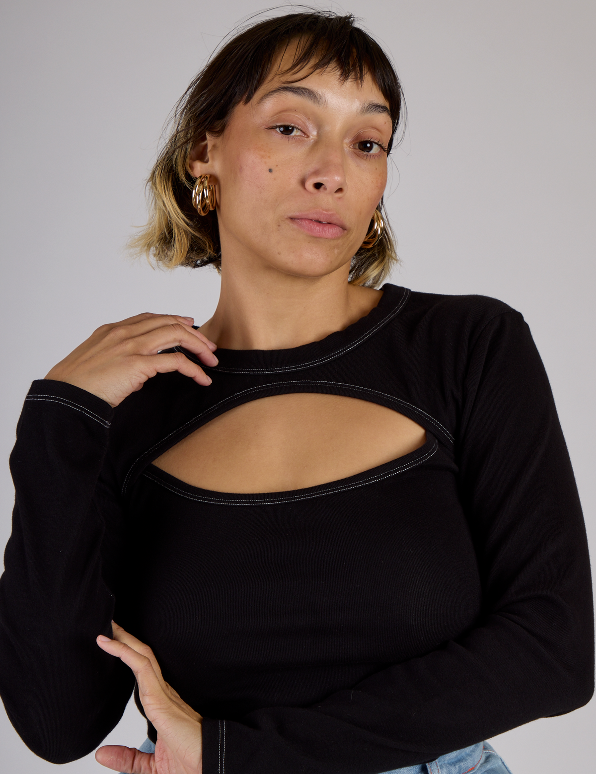 Close up Tiara wearing the Black Porthole Long Sleeve Tee
