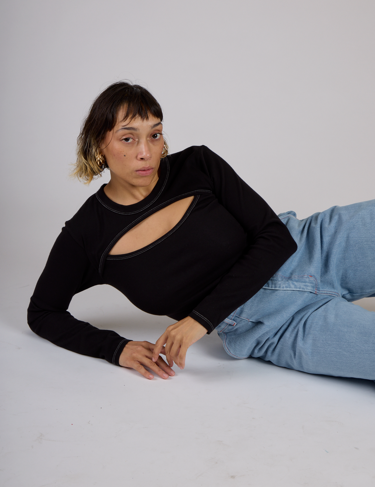 Tiara wearing the Black Porthole Long Sleeve Tee