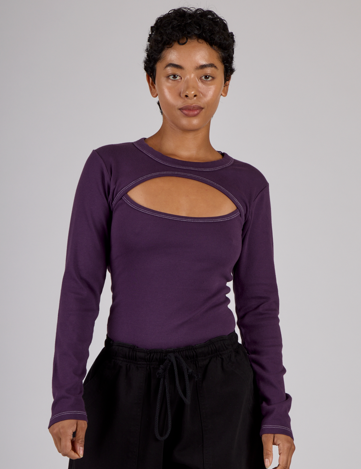 Mika wearing the Nebula Purple Long Sleeve Porthole Tee