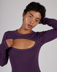 Close up of Mika wearing the Nebula Purple Long Sleeve Porthole Tee