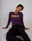 Mika wearing the Nebula Purple Long Sleeve Porthole Tee with the Black Drop Pocket Pants