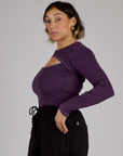 Side view of the Nebula Purple Long Sleeve Porthole Tee on Tiara