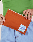 Pencil Pouch in Burnt Terracotta held by model