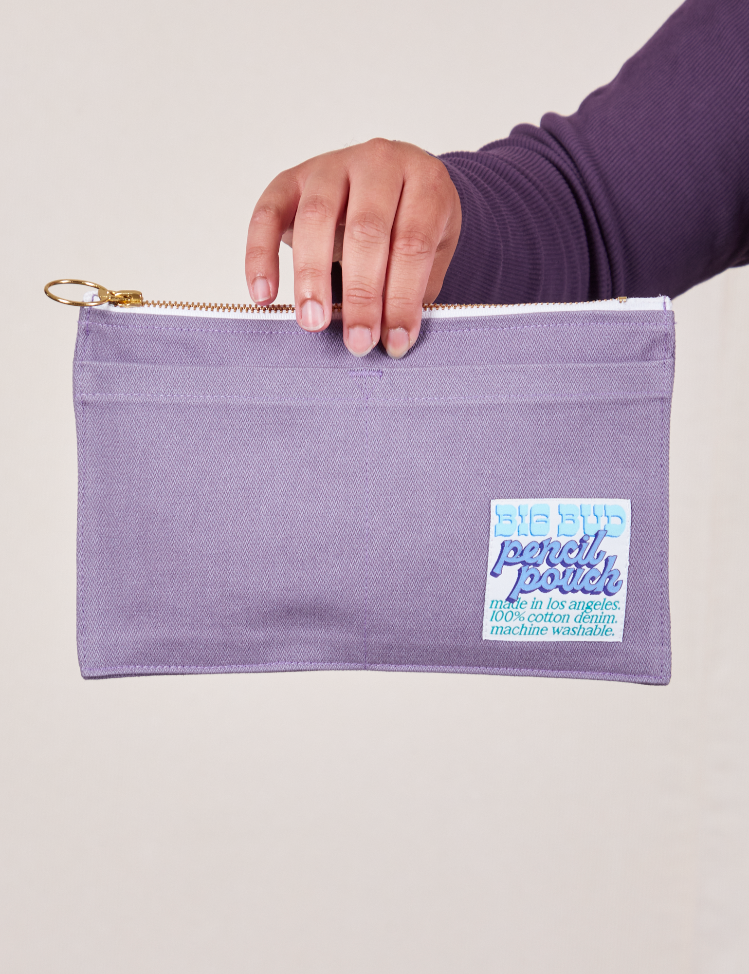 Pencil Pouch in Faded Grape held by model