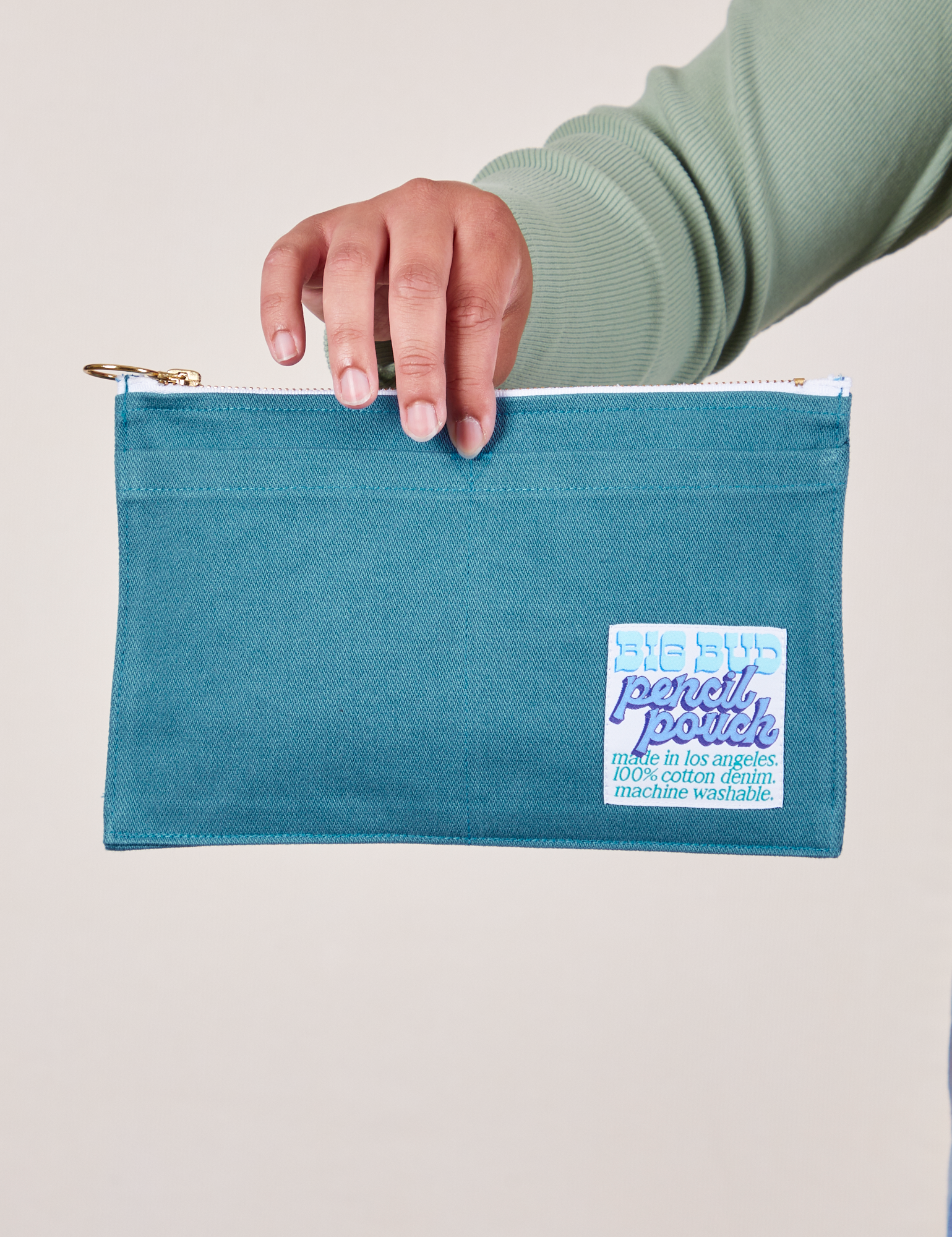 Pencil Pouch in Marine Blue held by model