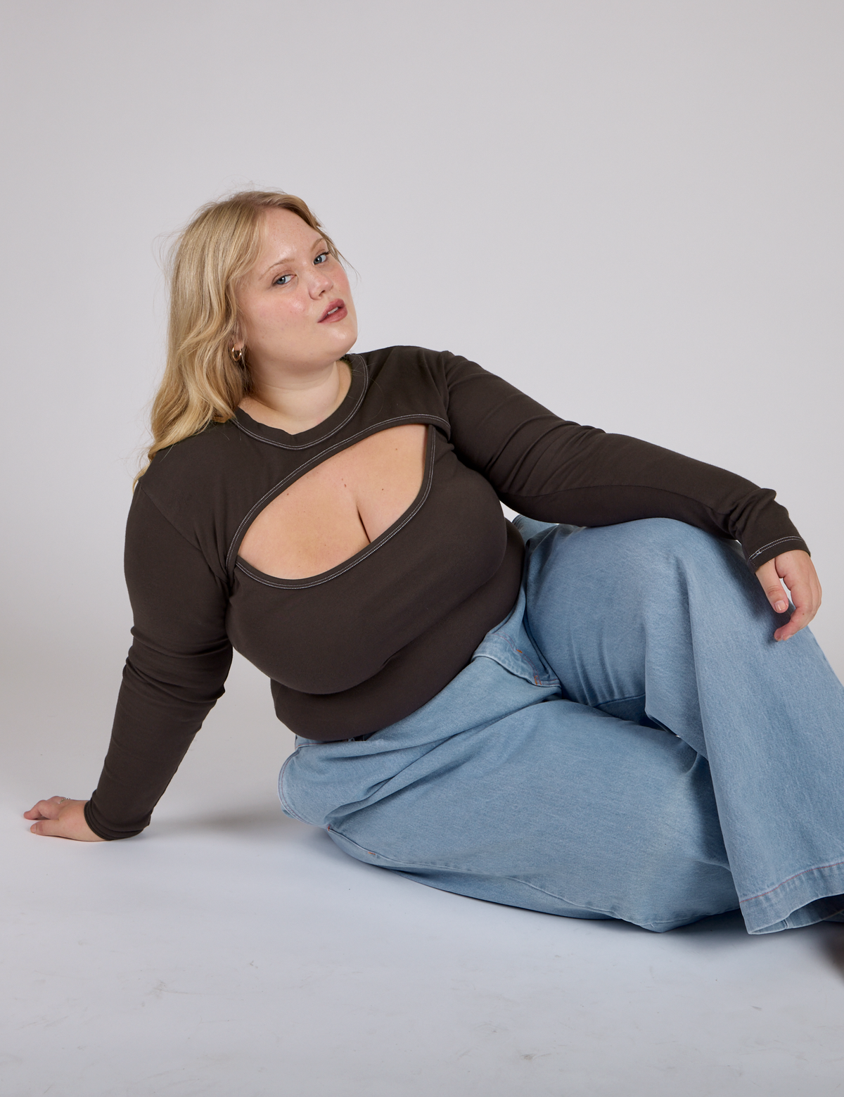 Juliet in the Espresso Brown Long Sleeve Porthole Tee with Light Wash Wide Leg Denim Trousers