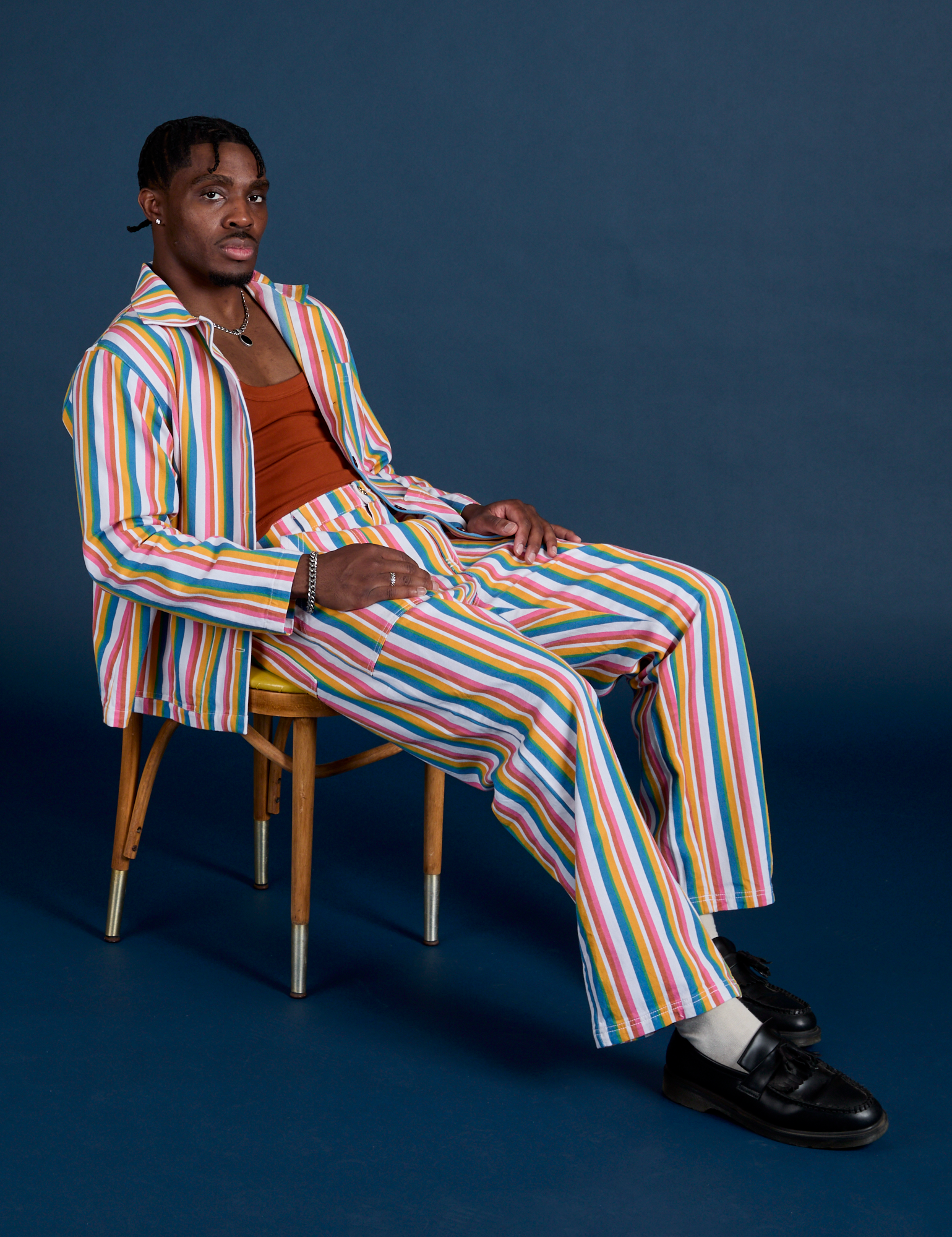 Work Pants in Rainbow Stripe and paired with matching Work Jacket on Isaac