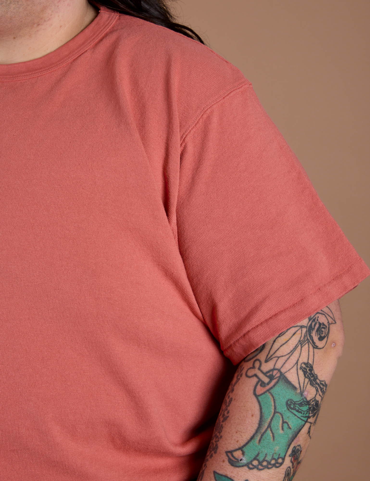 Sleeve close up of Burly Tee in Raspberry Sorbet on Sam