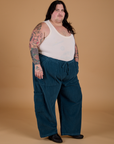 Angled front view of Corduroy Drop Pocket Cargo Pants in Lagoon on Sam