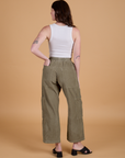 Back view of Corduroy Drop Pocket Cargo Pants in Khaki Grey and Cropped Tank in Vintage Tee White on Alex