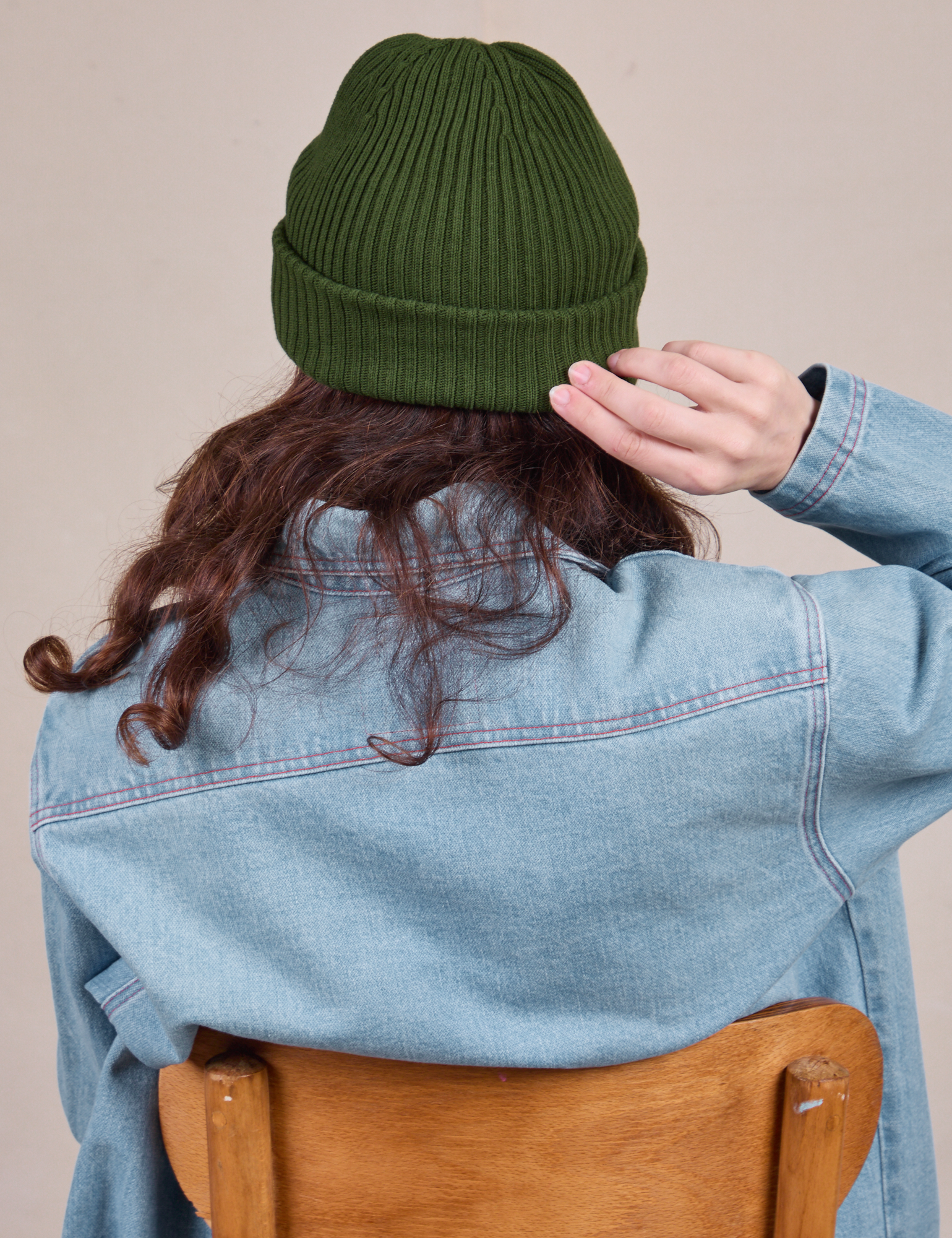 Back view of Ribbed Beanie in Evergreen on Alex