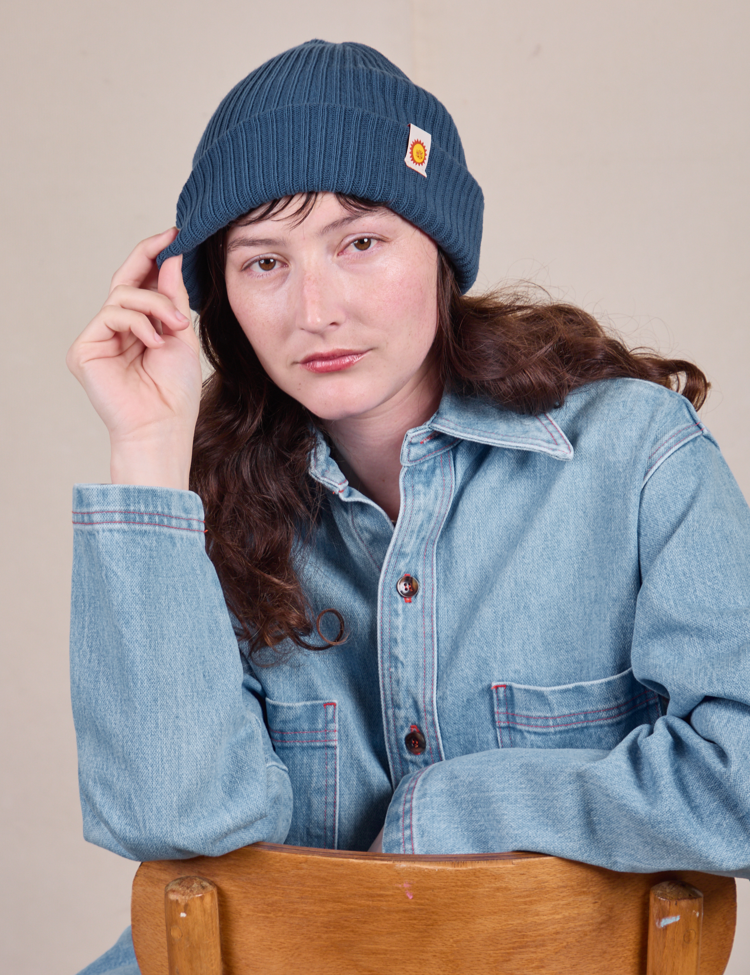 Alex is wearing Ribbed Beanie in French Blue