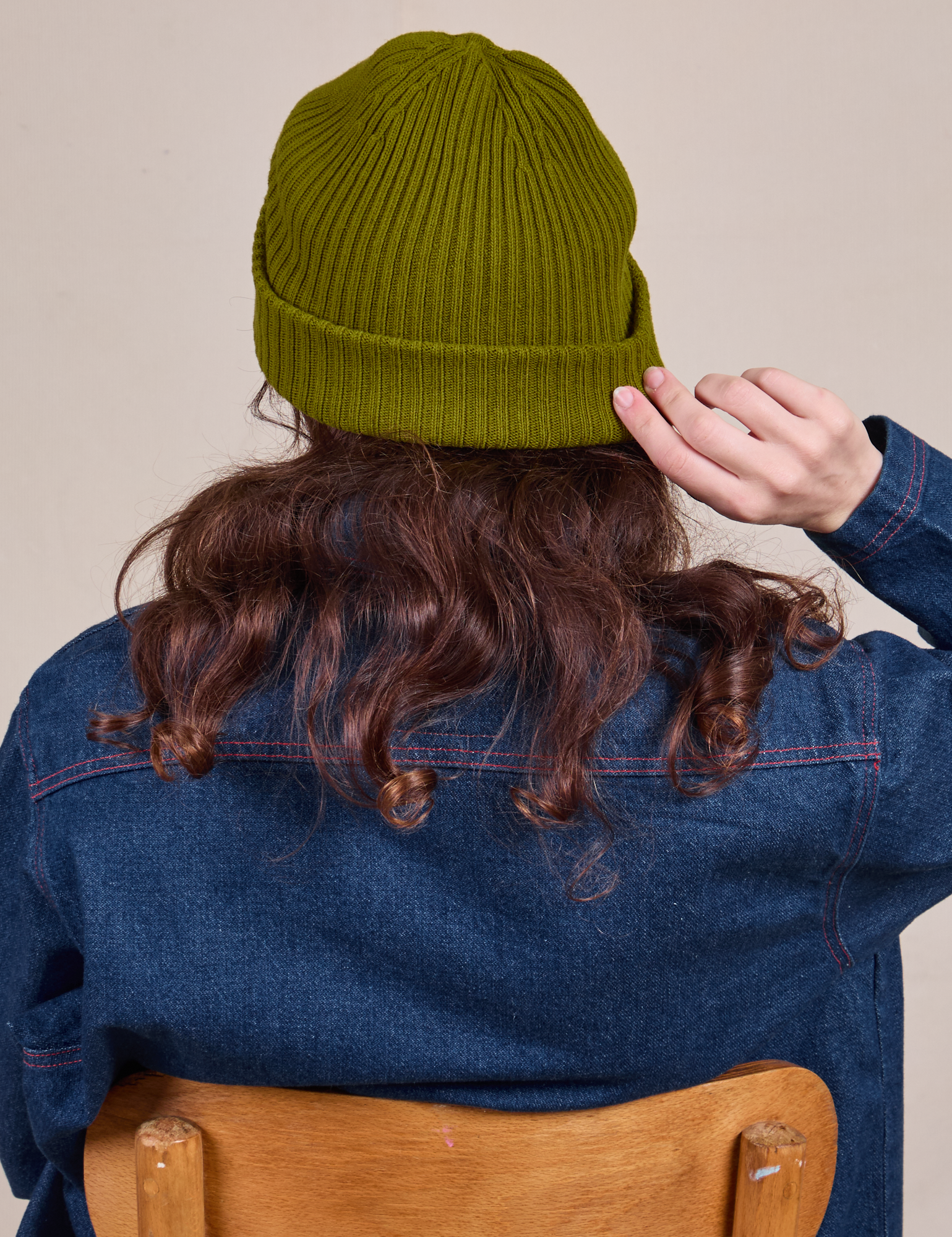 Back view of Ribbed Beanie in Olive Green on Alex
