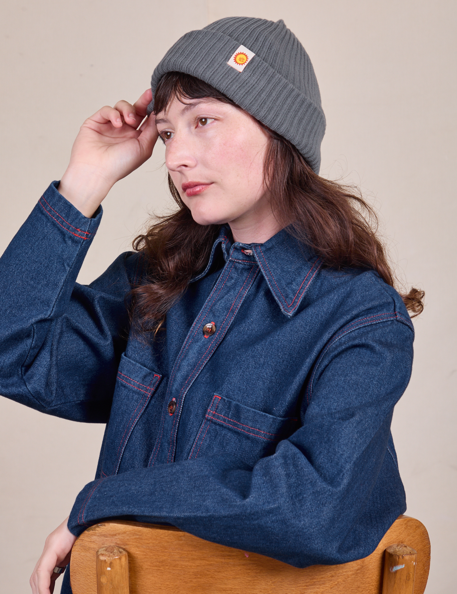 Alex is wearing Ribbed Beanie in Slate Grey